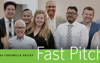 A diverse group of people pose for a photo at Coachella Valley Fast Pitch.